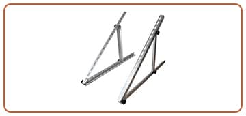 Two metal triangular PV panel support brackets with adjustable arms are positioned side by side on a white background, bordered by a thin brown line. Garland UK