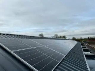 Close up of solar panels installed on a metal clad roof