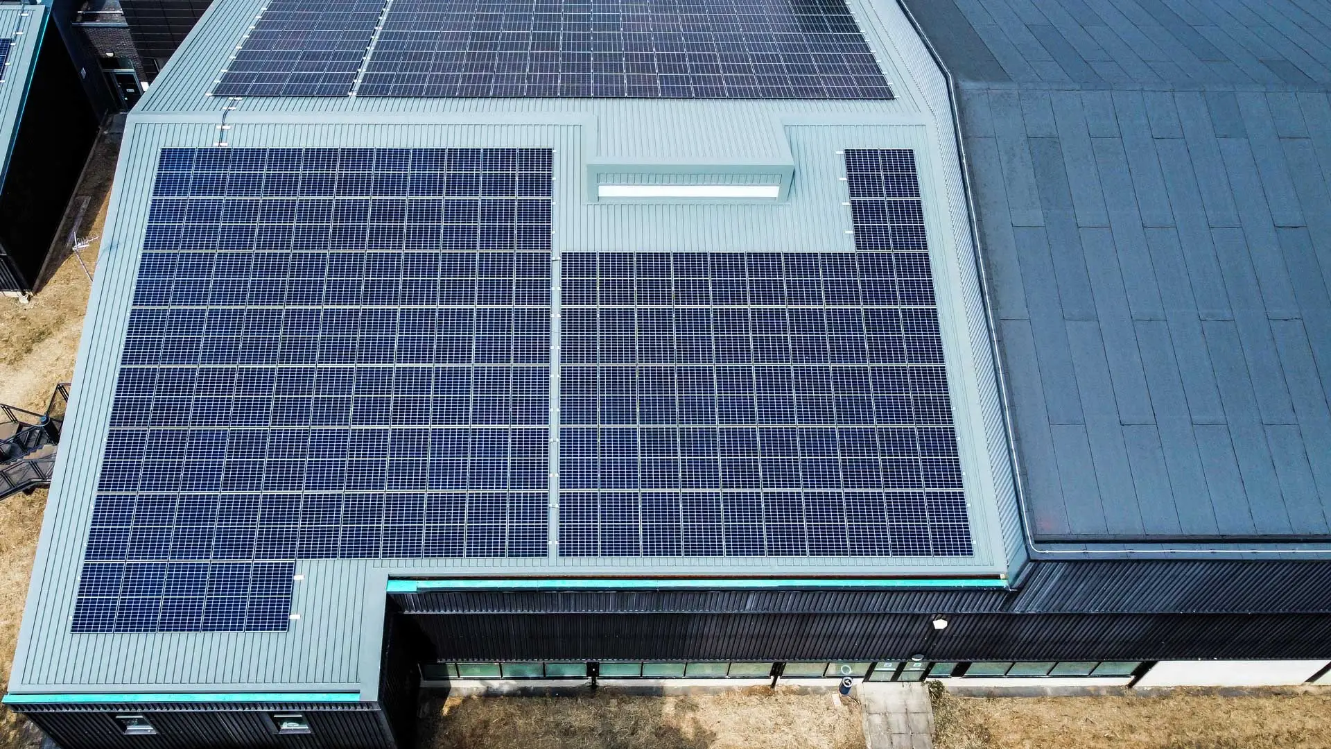 Metal roof system for leisure centre with solar PV panels