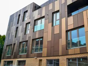 Combustible cladding replacement using R-MER Shield rainscreen system