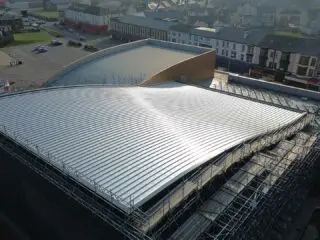 inished storm-resilient roof securing SC2 Water Park community facility