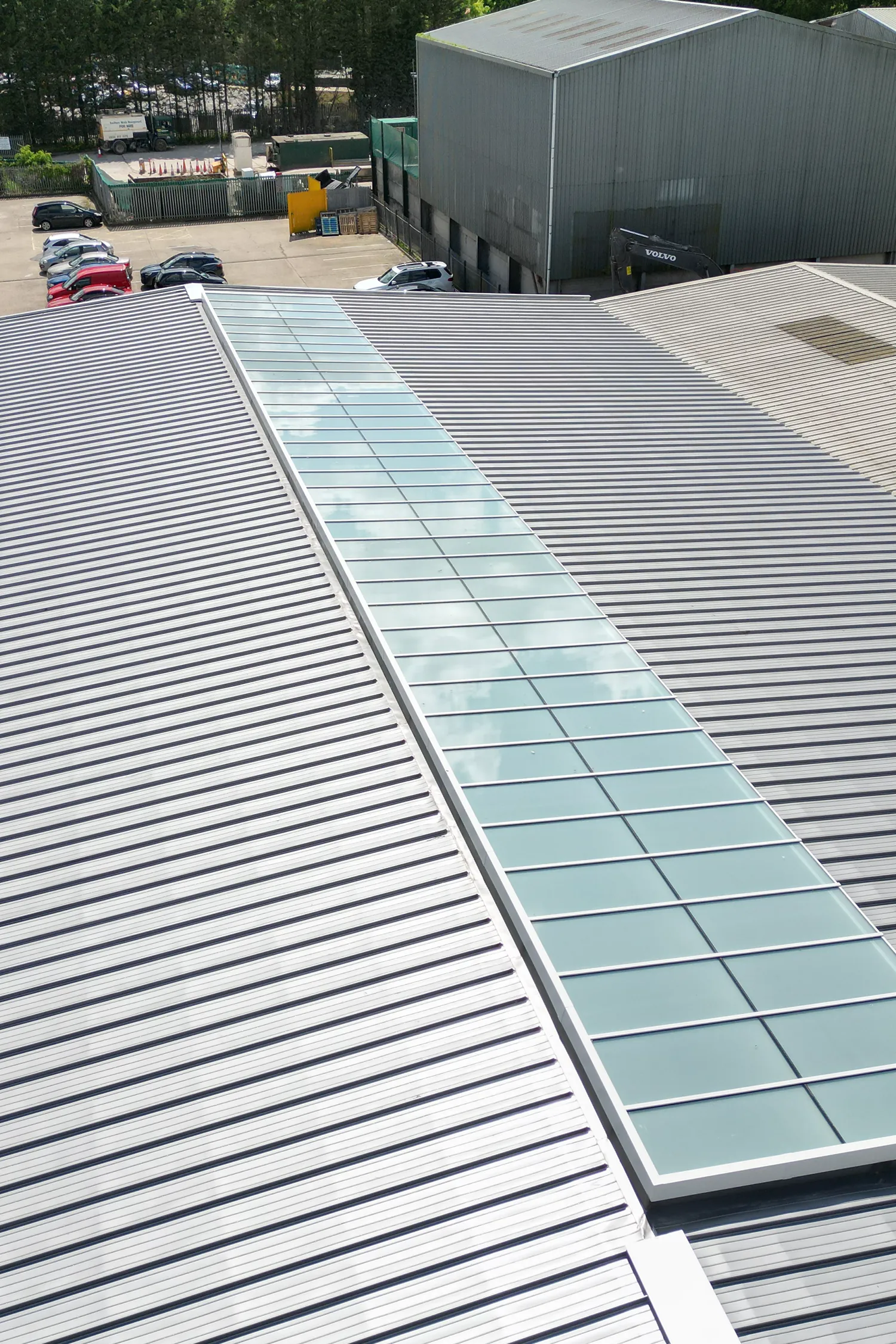 Solar panels installed on standing seam metal roof industrial facility