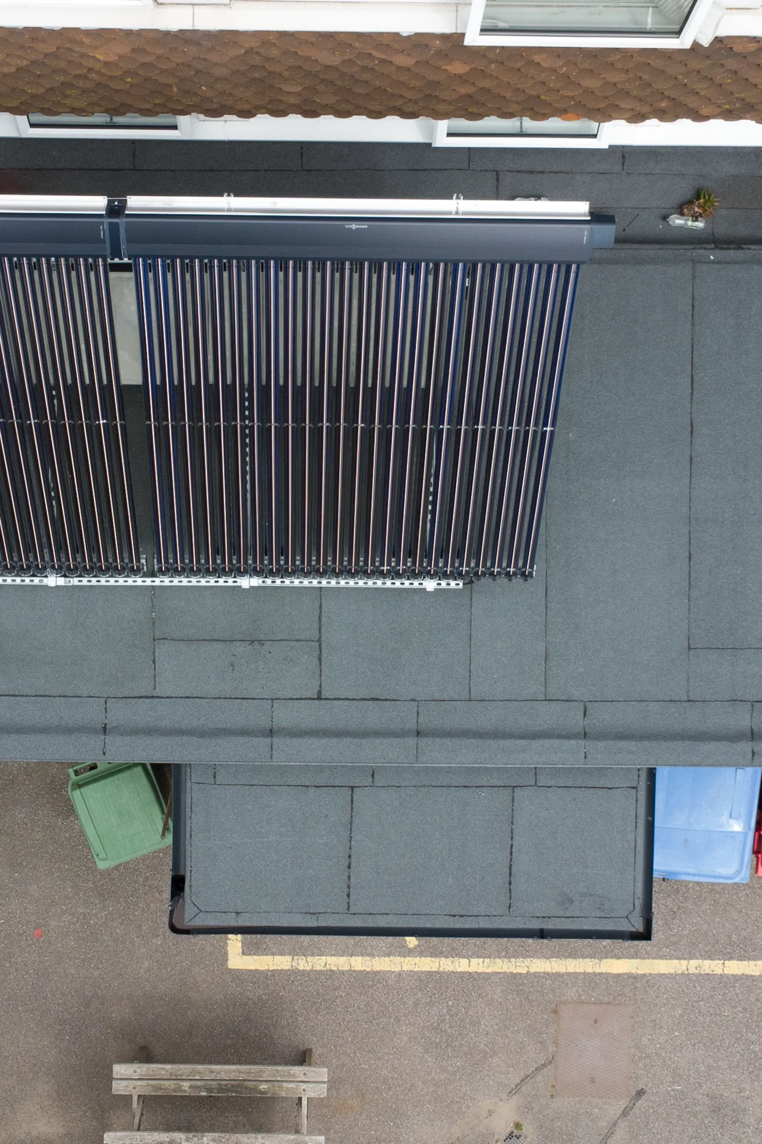 Aerial view solar panels installed on fire station roof structure