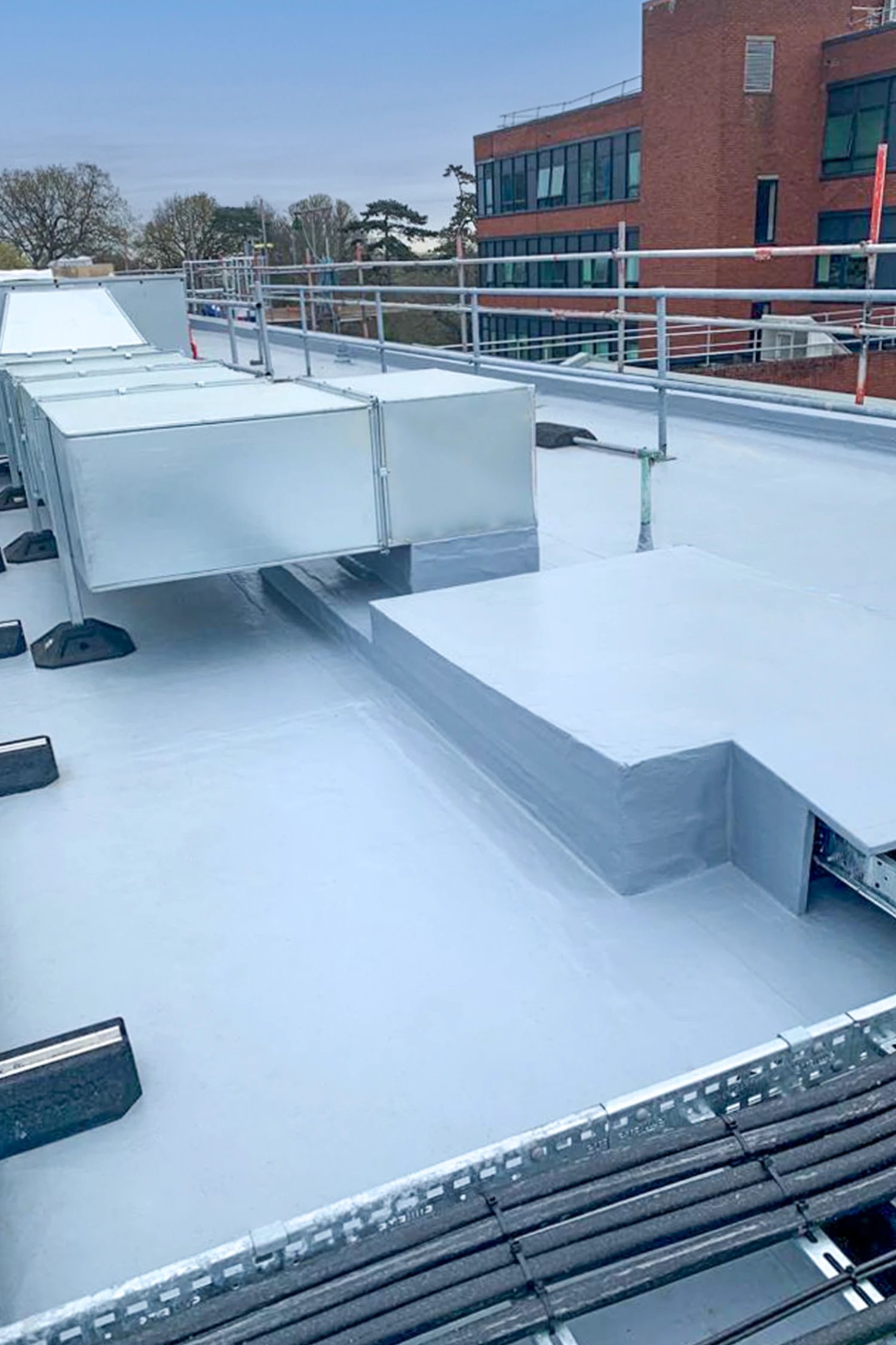Flat roof waterproofing installation at Queen Mary's Hospital building