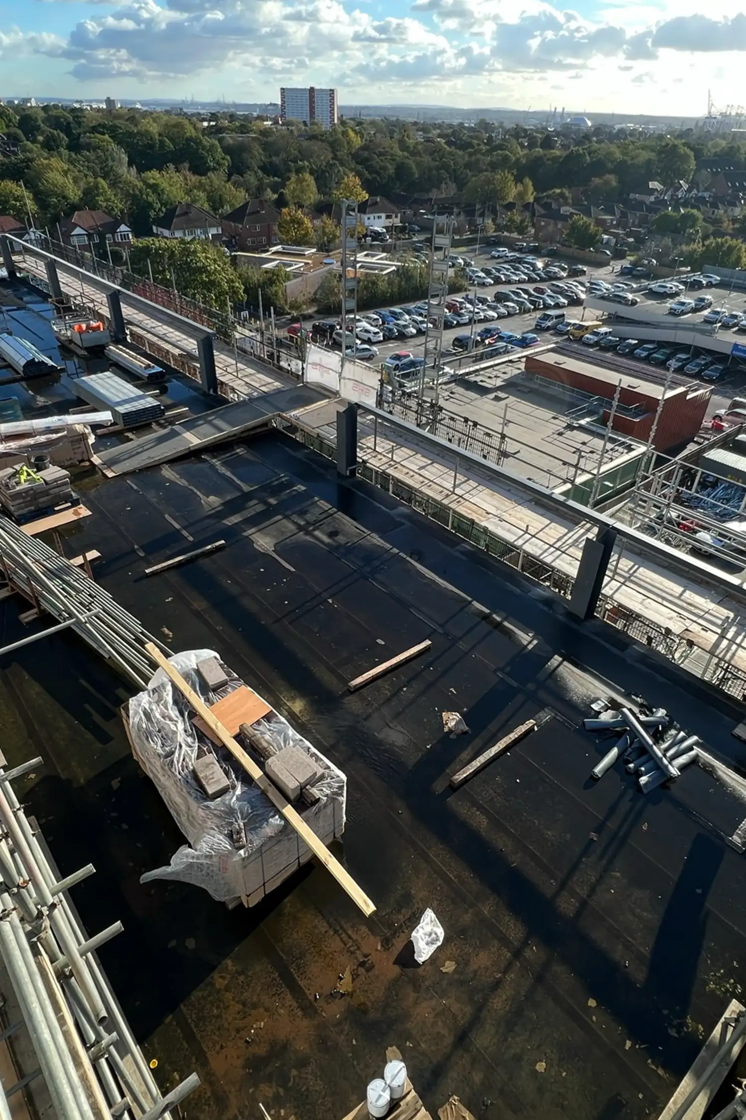 Aerial view of Southampton General Hospital construction site with parking lot and surrounding residential area