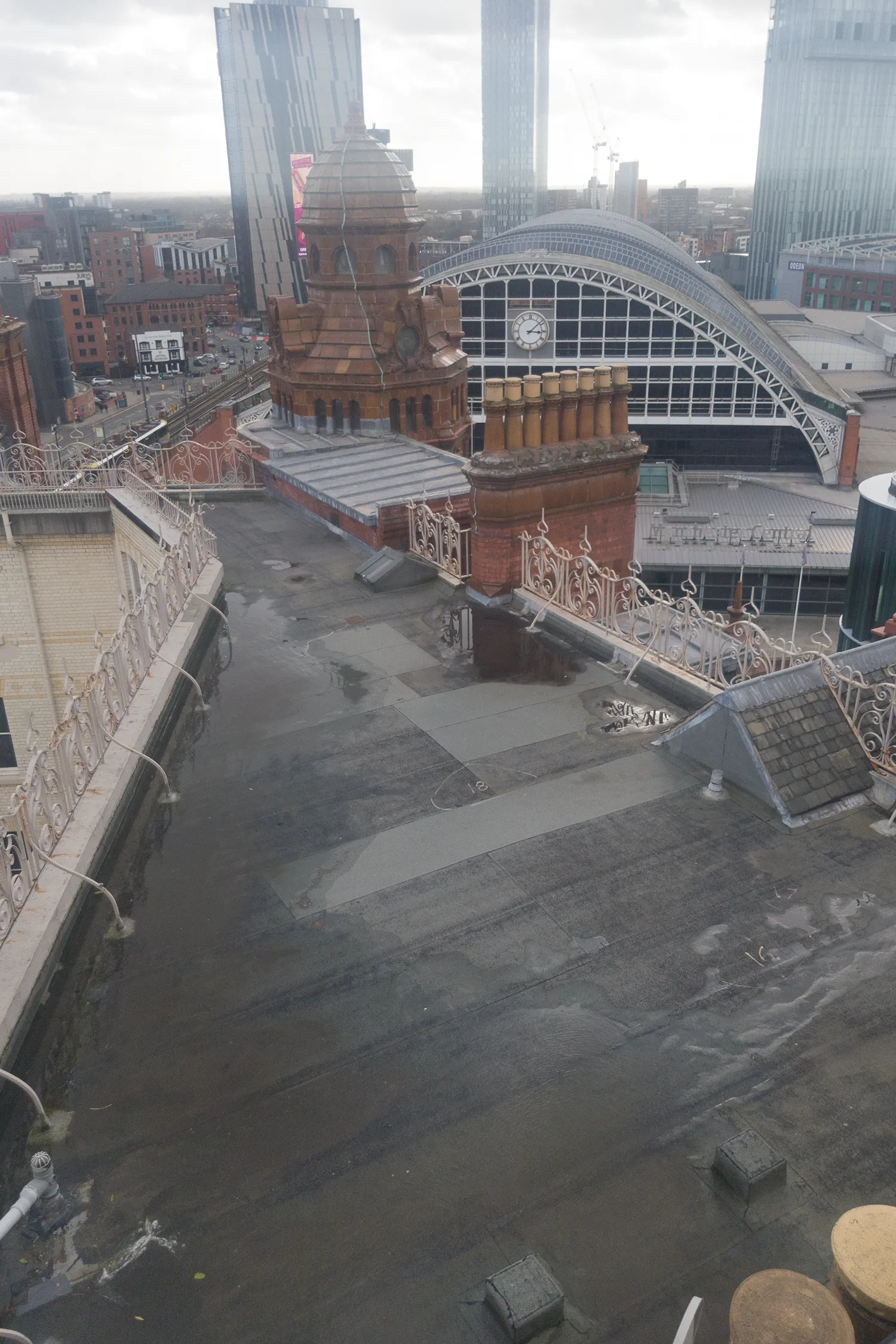Aerial view of historic Midland Hotel clock tower and railway station architecture Birmingham