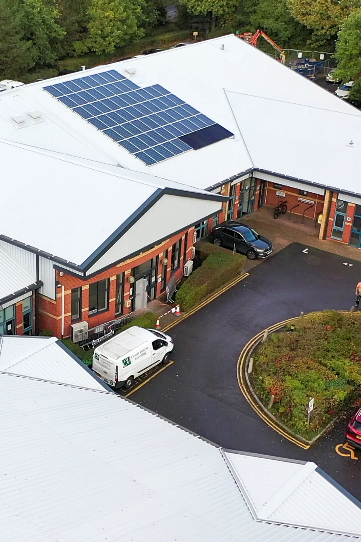 Aerial view of New Forest Enterprise Centre with solar panels and parking area